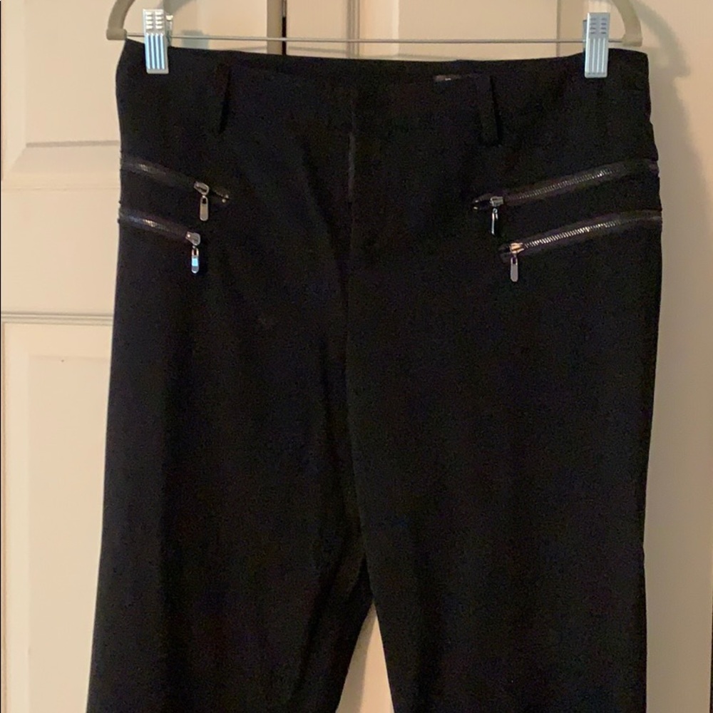 Black skinny pants with zippers
